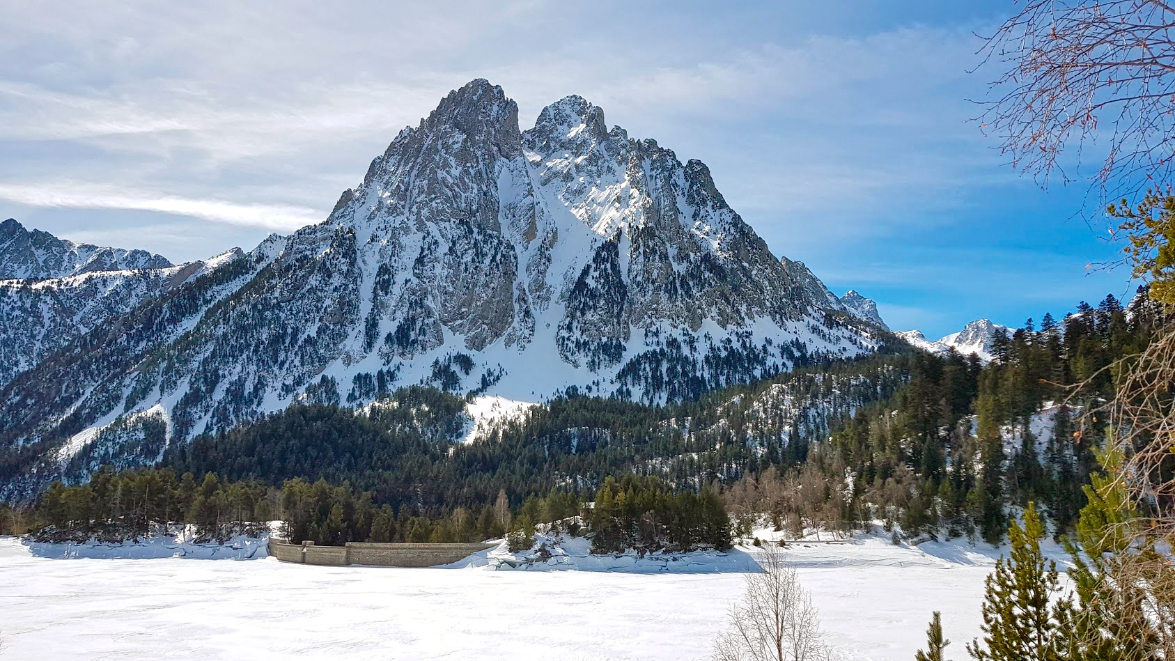 Els Encantats peaks rising above Estany de Sant Maurici in Aigüestortes National Park