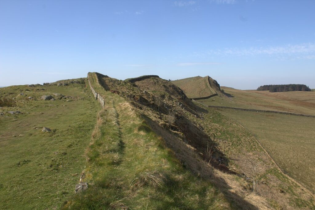 Hadrian's Wall crossing the green hills of northern England